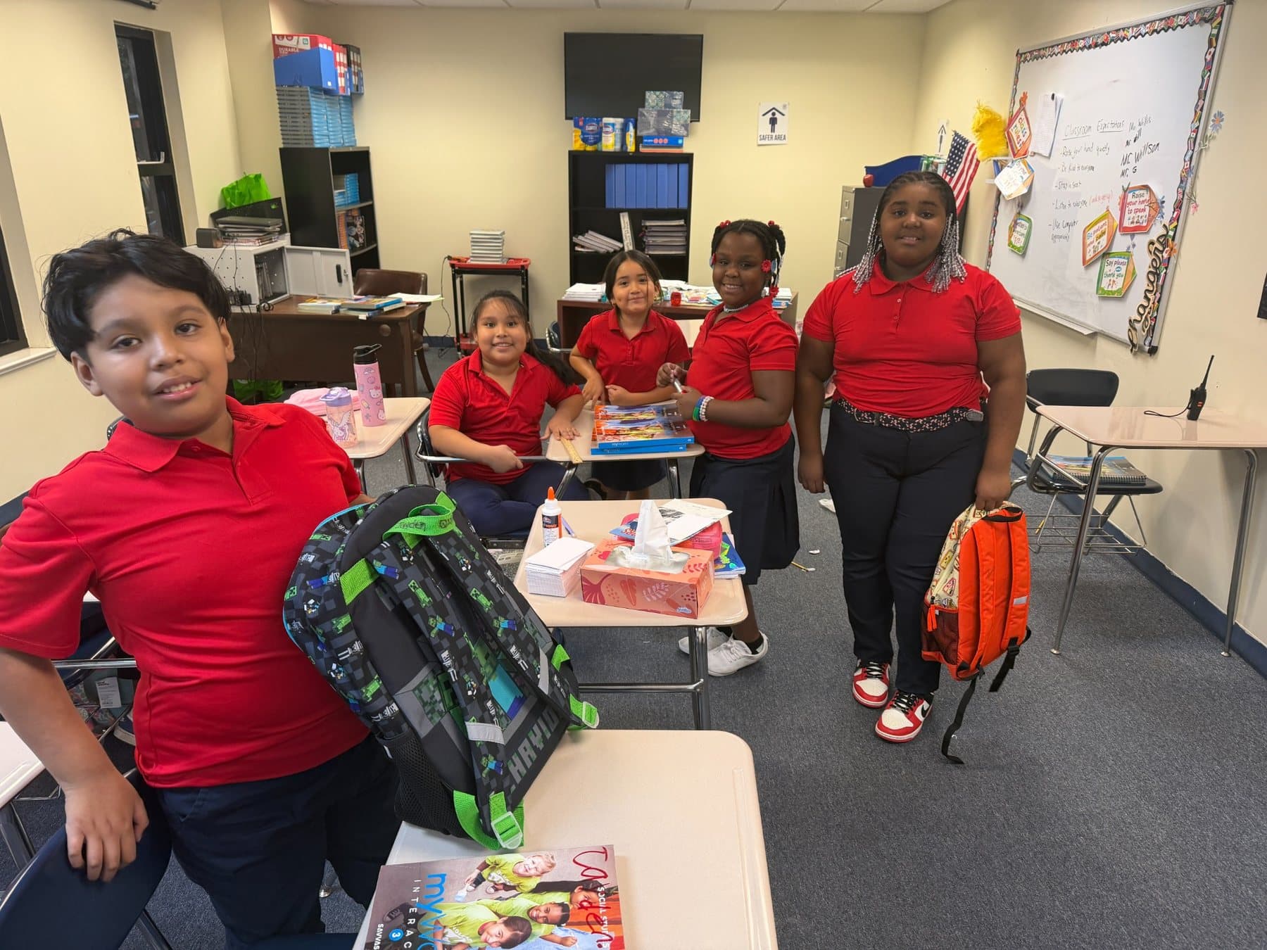 Students learning together in a Saint Peter’s Academy classroom.