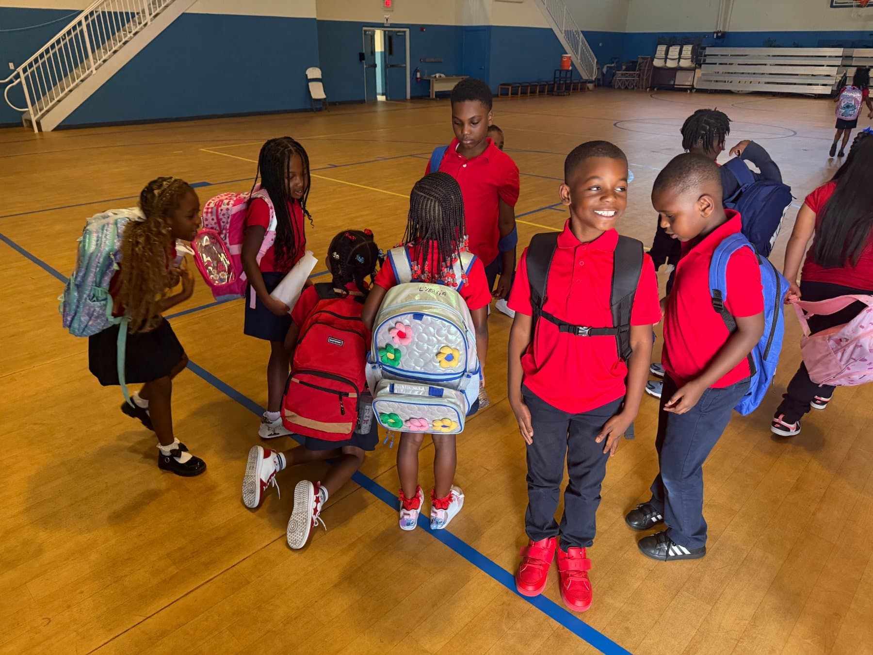 Saint Peter’s Academy students sharing a joyful moment during the school day.