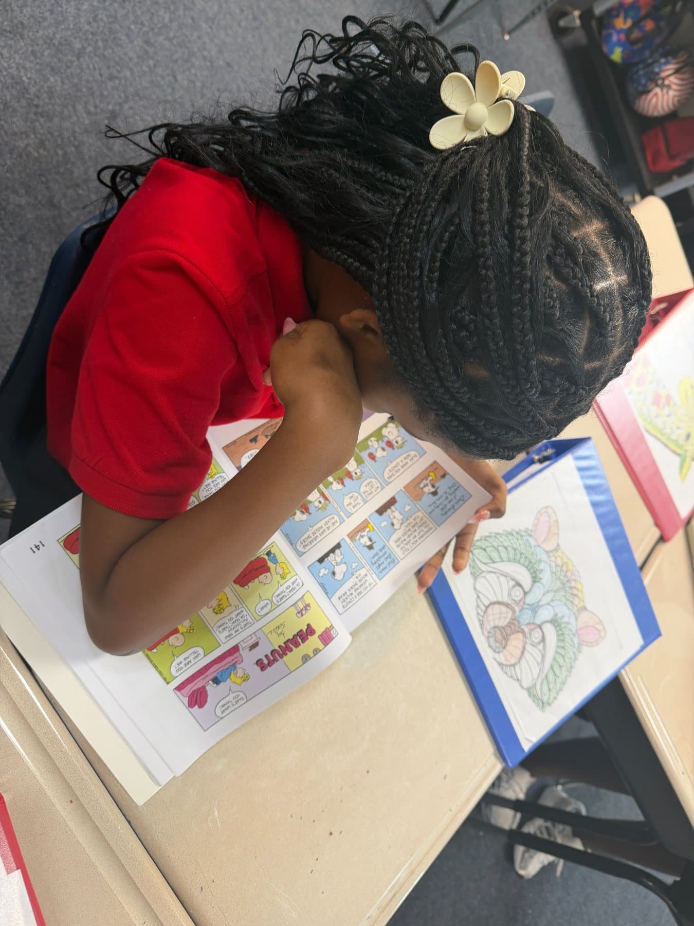Students working together in a Saint Peter’s Academy classroom.