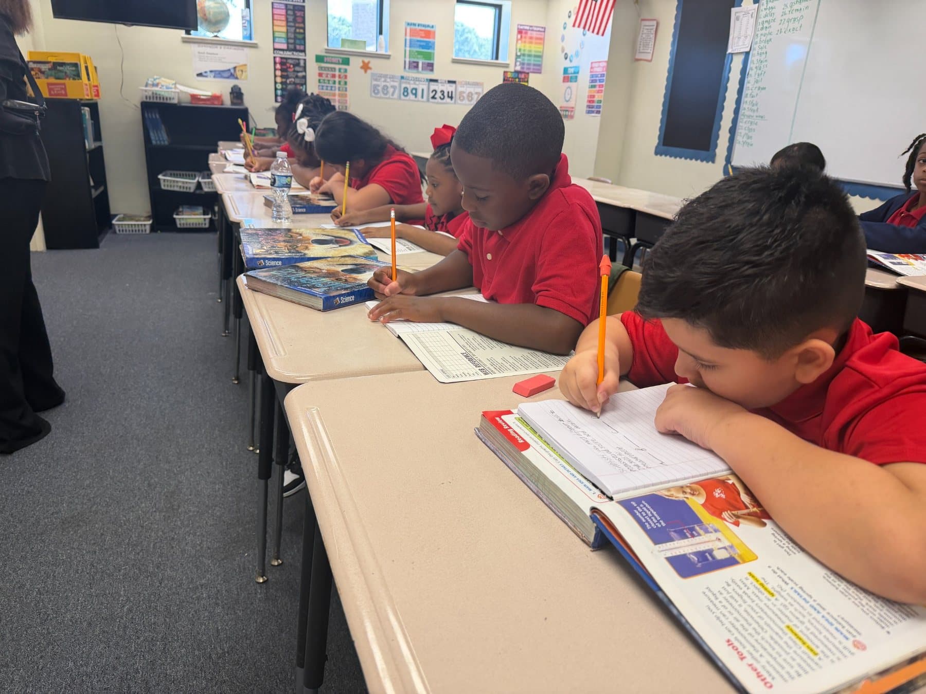 Students focused on classroom work at Saint Peter’s Academy.